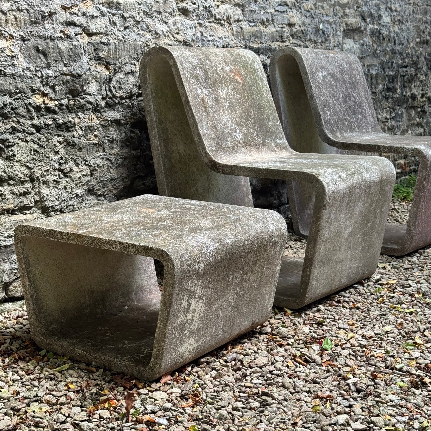 Brutalist concrete loop chairs and table 1970s