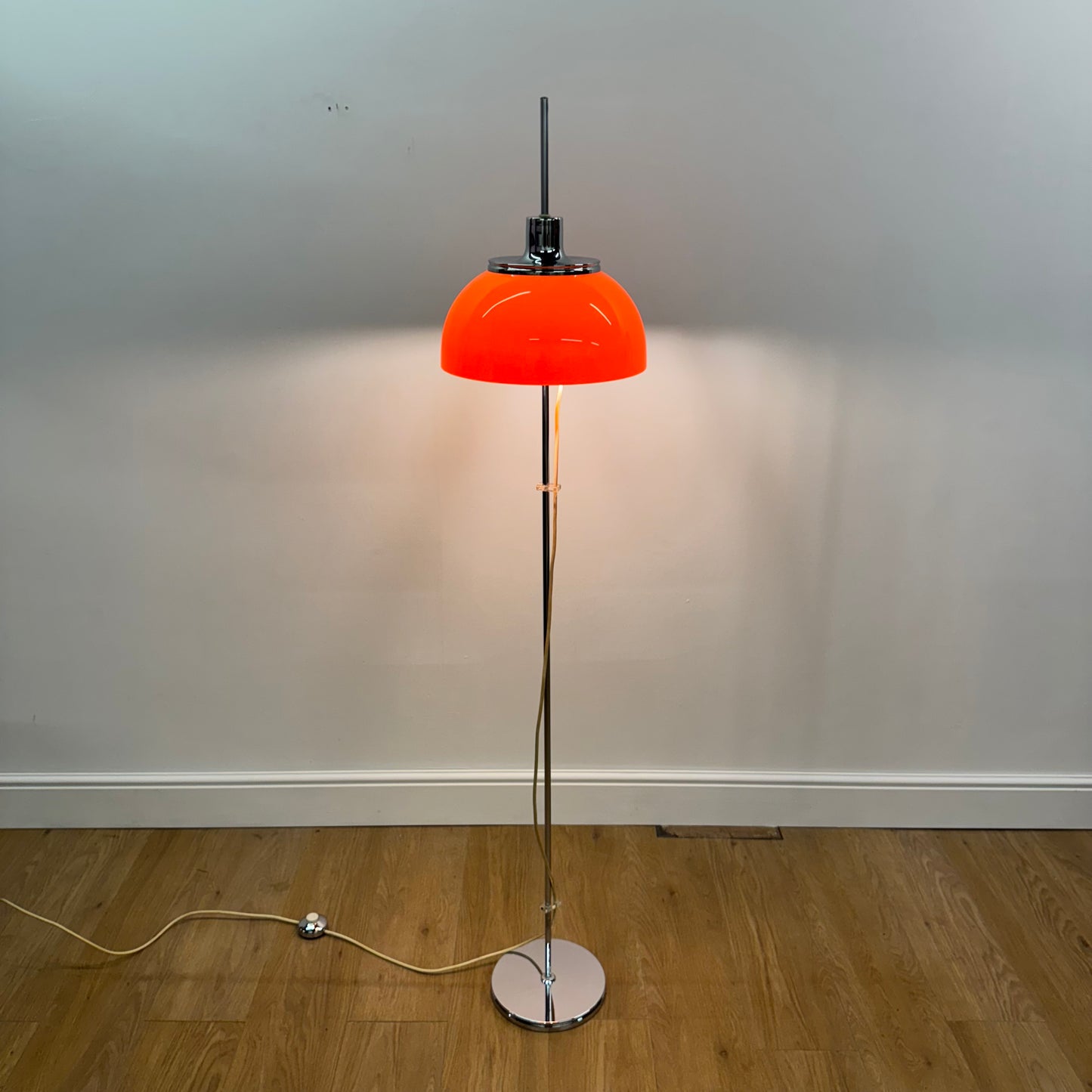 Orange 1970s floor lamp by Guzzini Italy