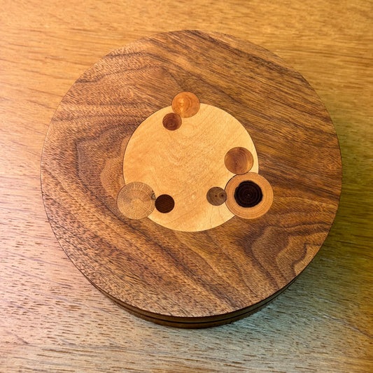 Circular lidded jewellery box with inlaid decoration