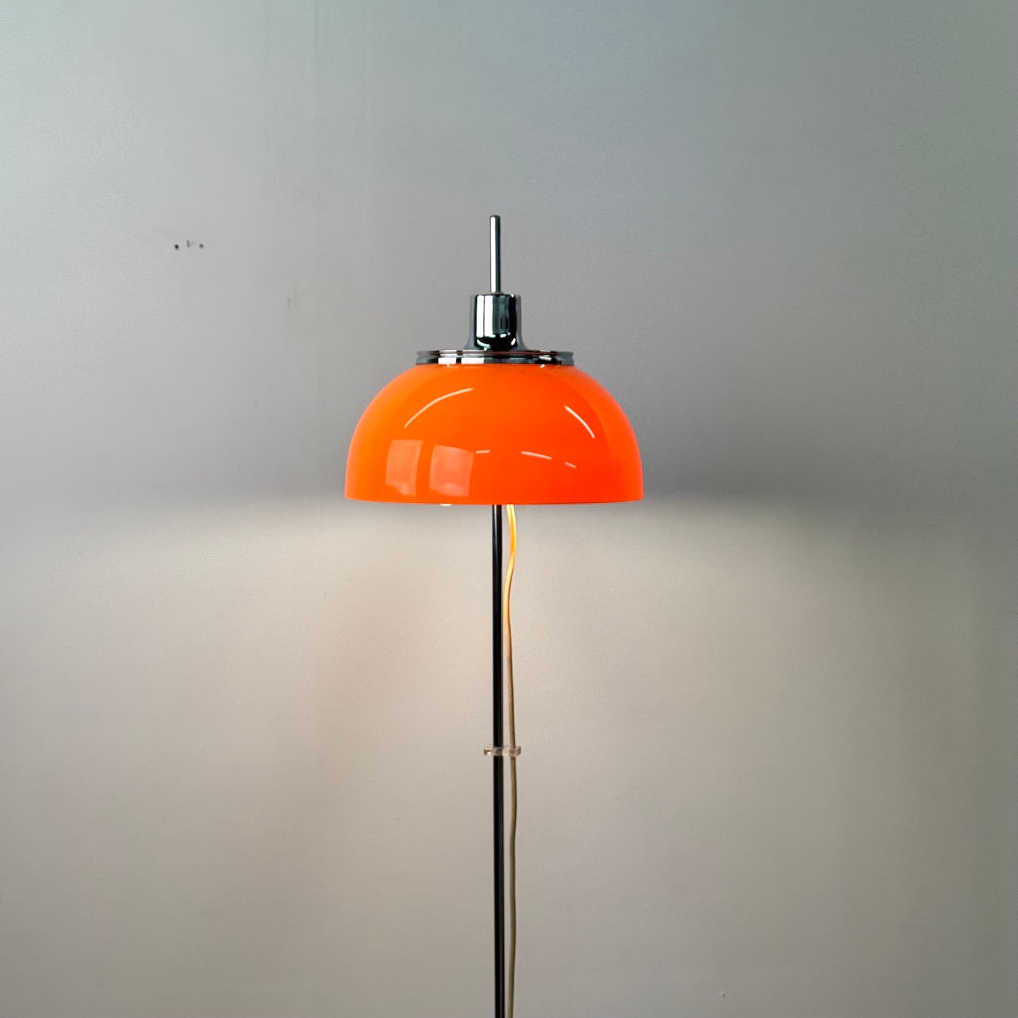 Orange 1970s floor lamp by Guzzini Italy