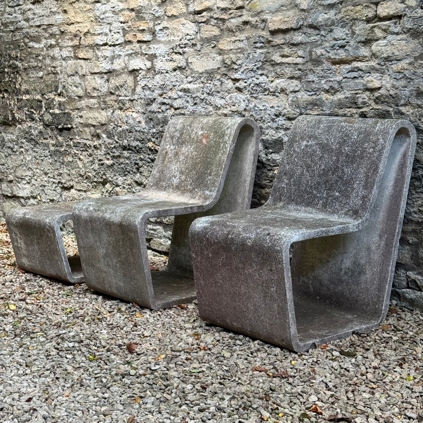 Brutalist concrete loop chairs and table 1970s