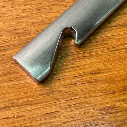 Brushed steel bottle opener by Wedgwood