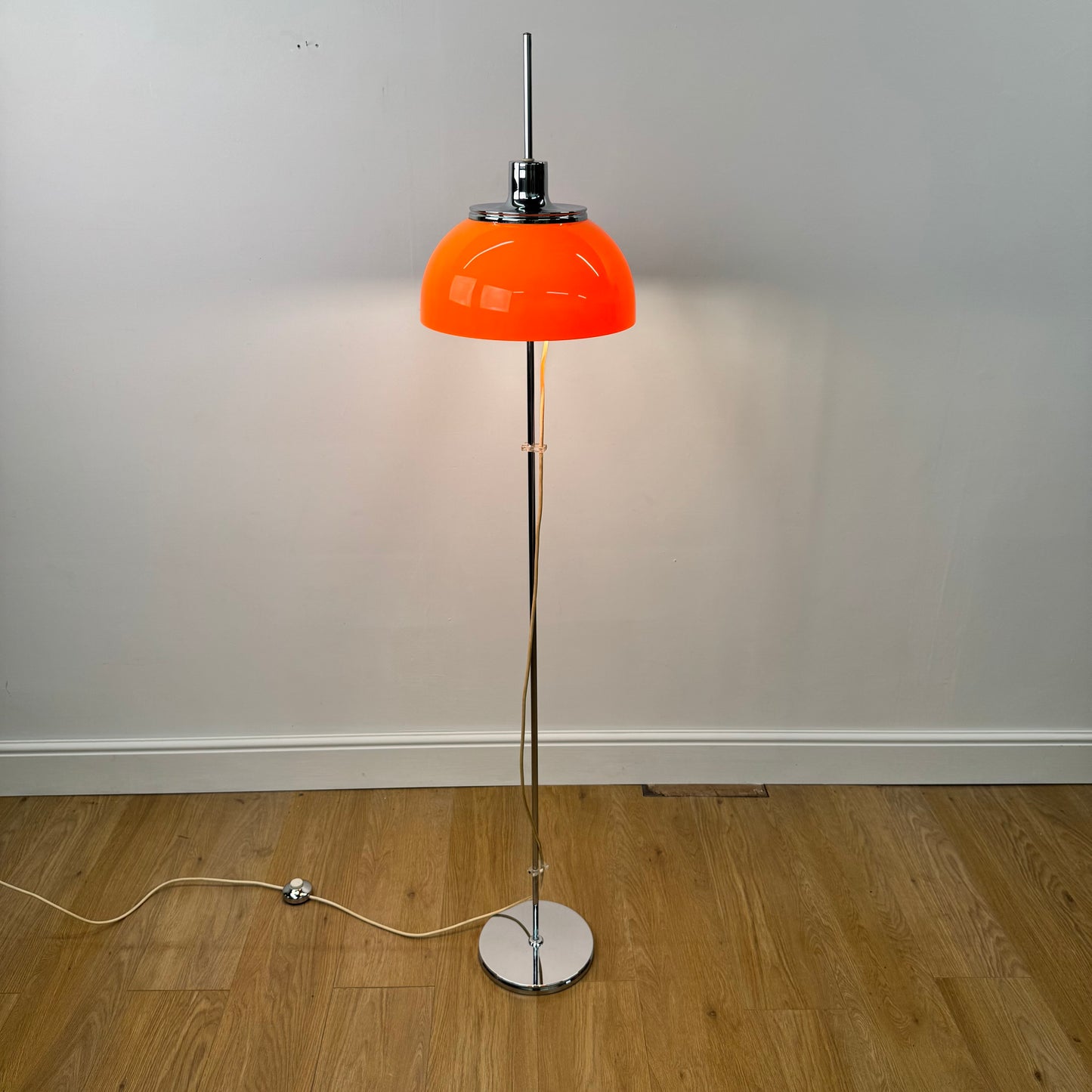 Orange 1970s floor lamp by Guzzini Italy