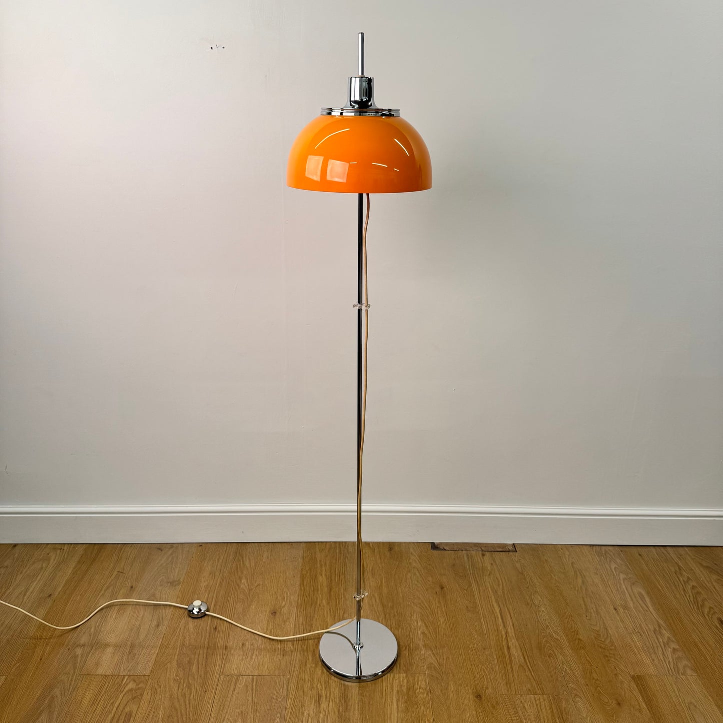 Orange 1970s floor lamp by Guzzini Italy