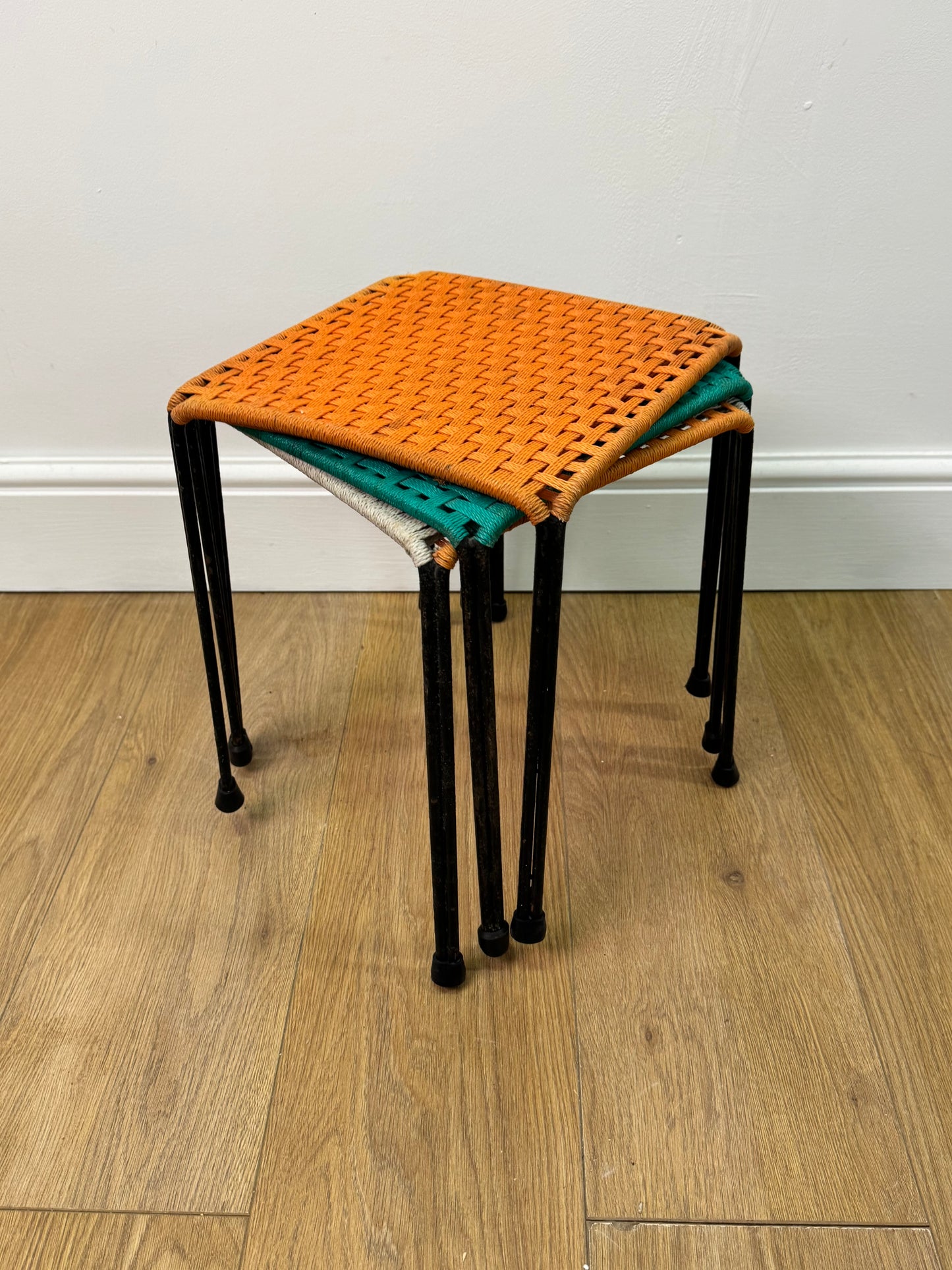 1950s woven stools on metal legs