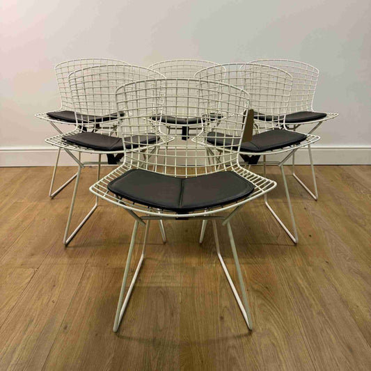 White wire chairs by Harry Bertoia for Knoll