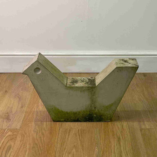 Brutalist concrete bird sculpture