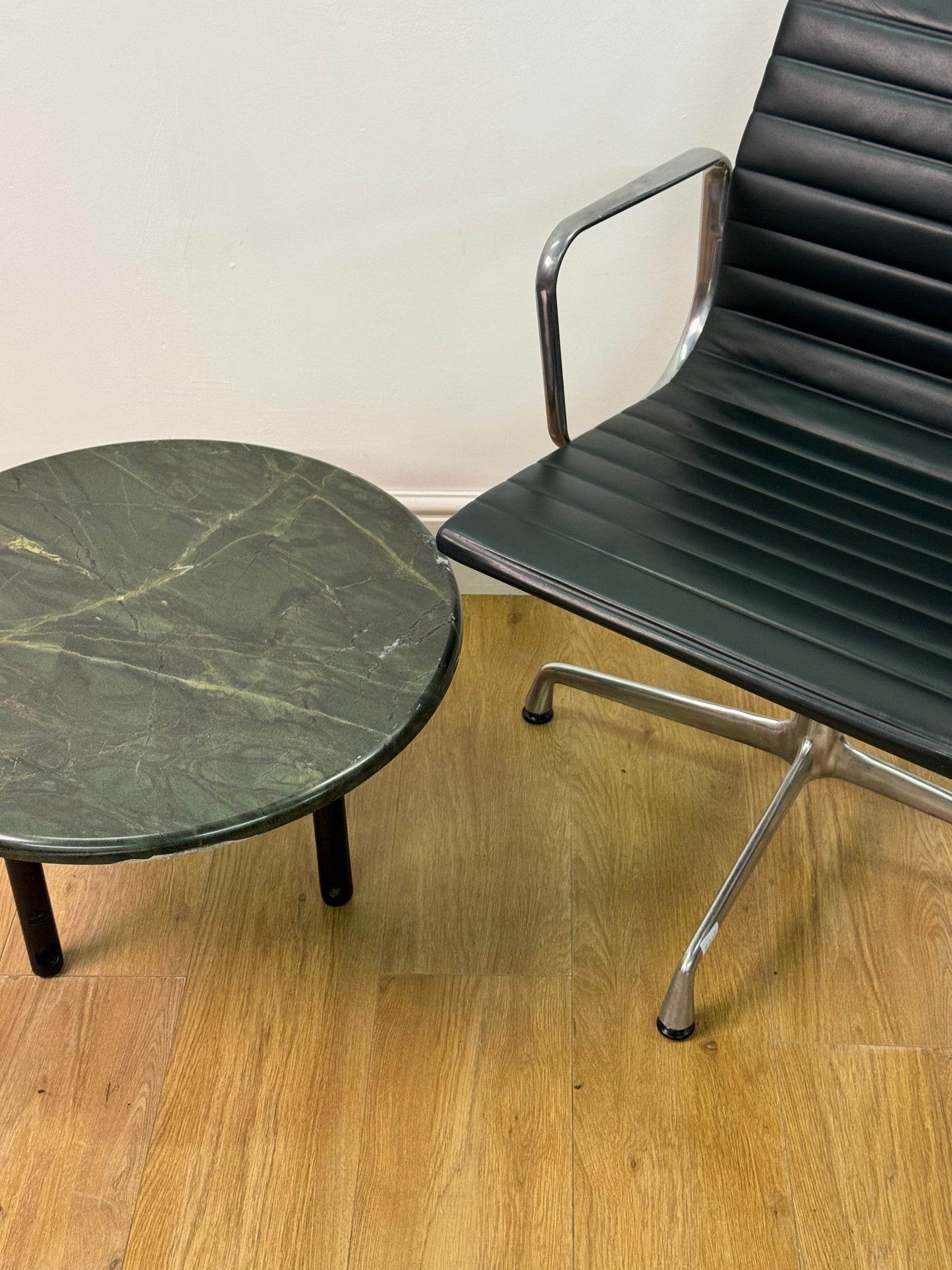 1980s marble top circular occasional table on black steel legs