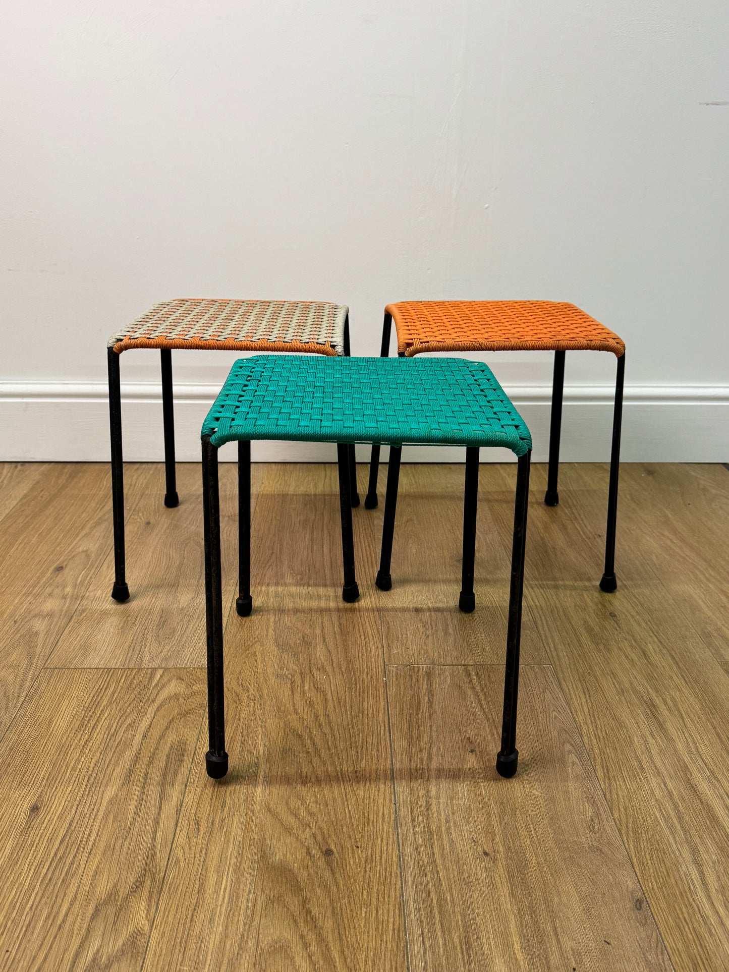 1950s woven stools on metal legs