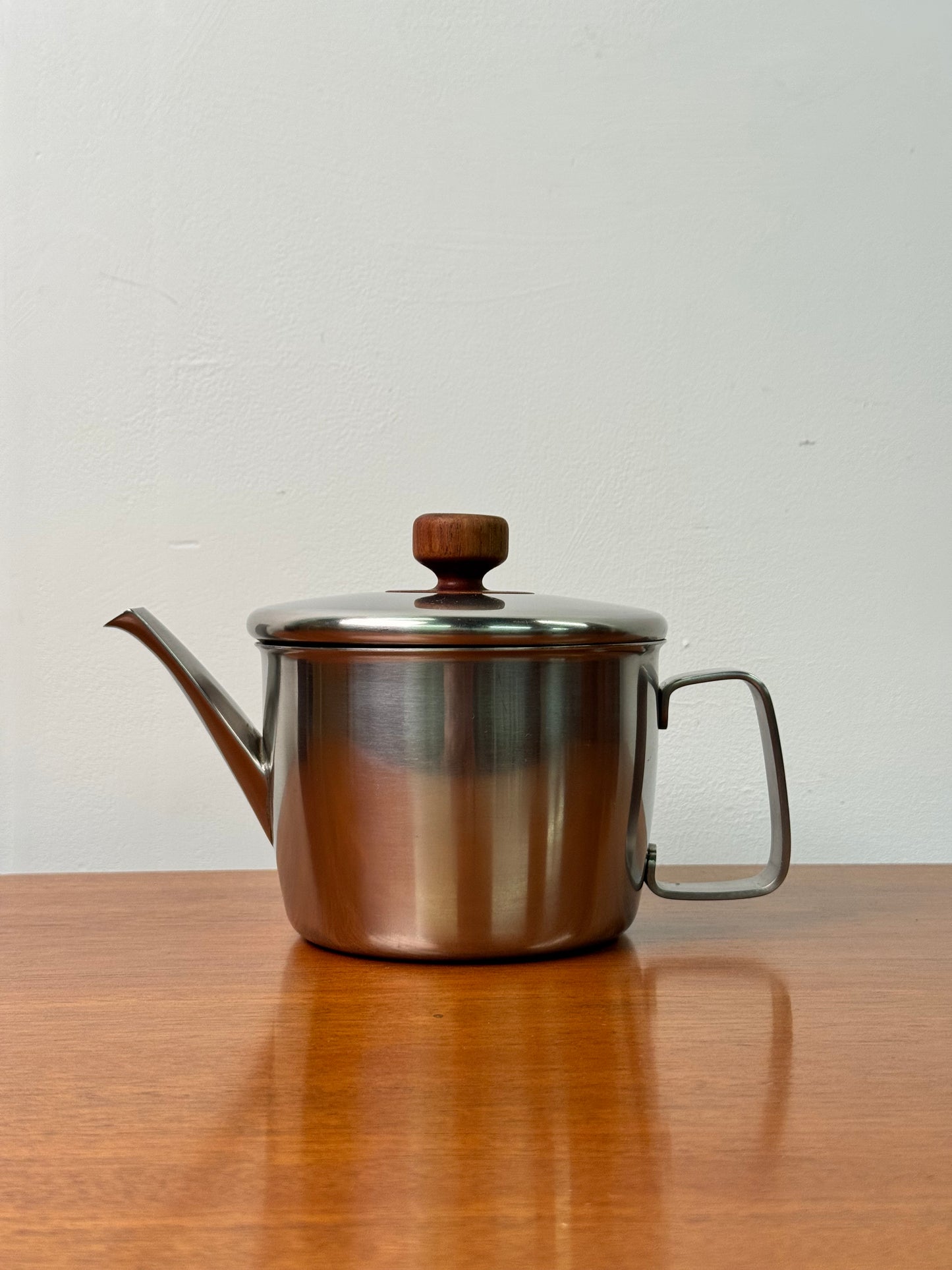 Stainless steel tea pot by Gerald Benney