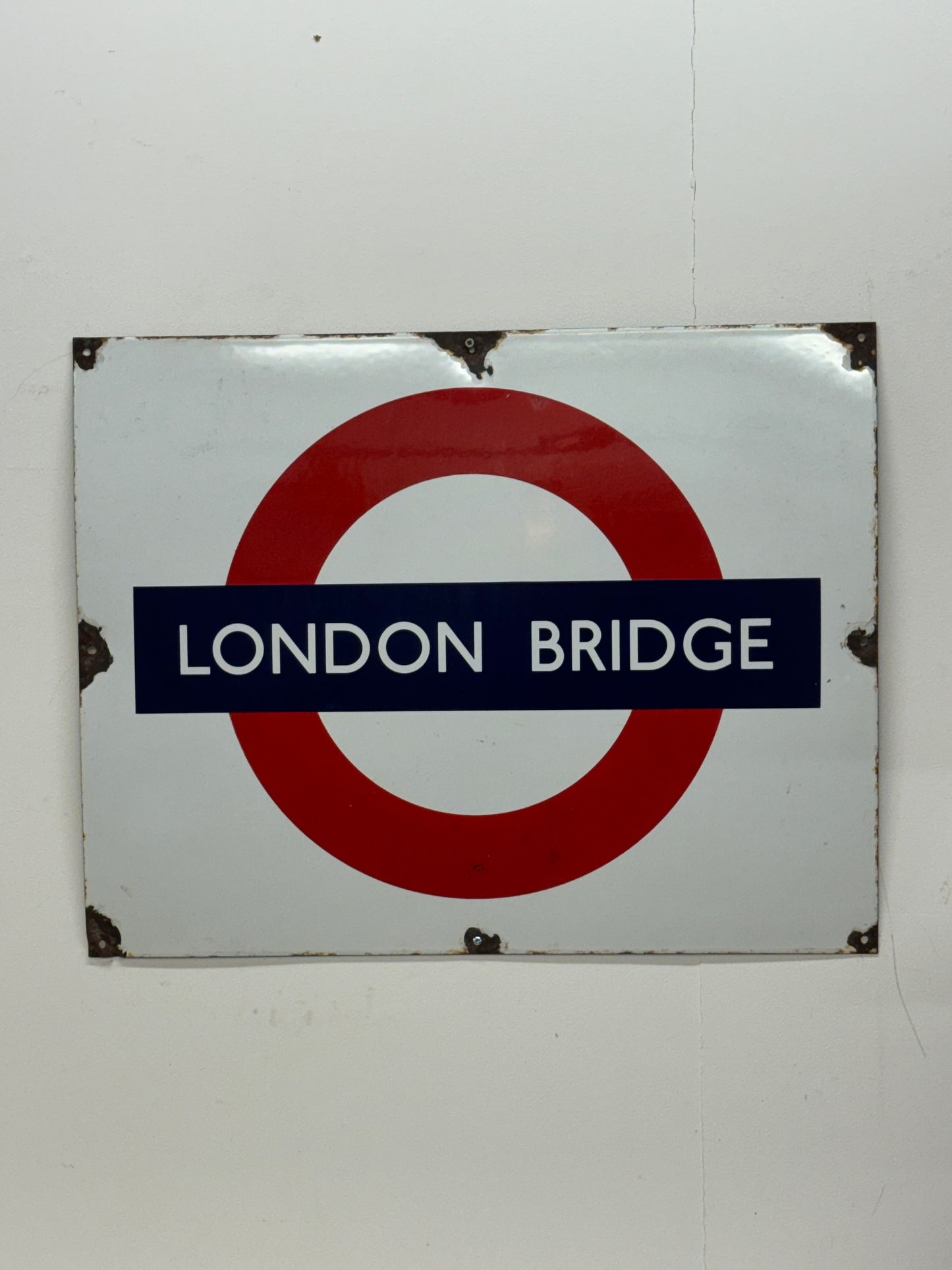 Vintage enamel underground signs