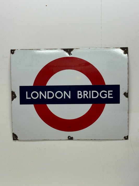 Vintage enamel underground signs