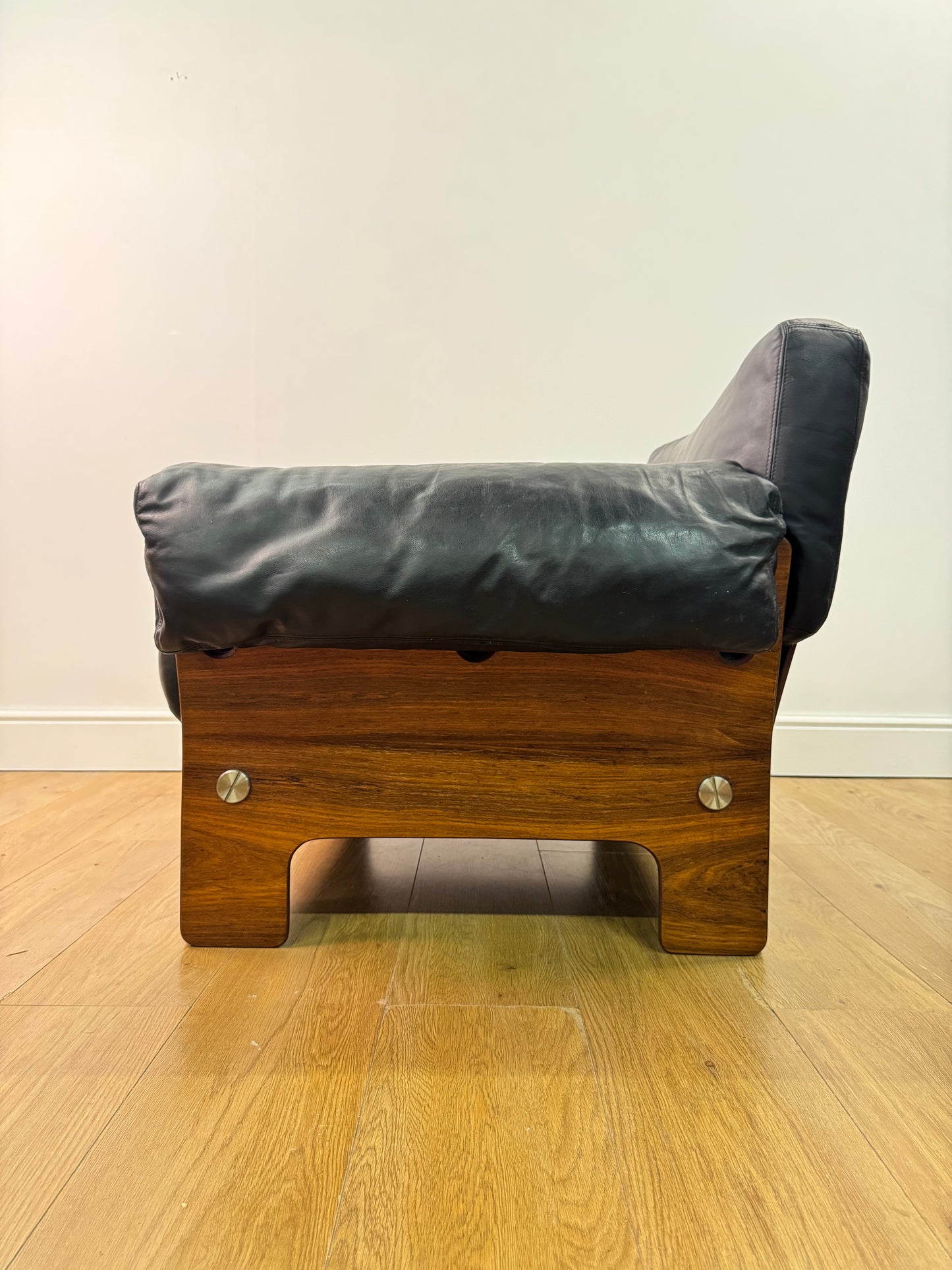Plywood and Leather armchair by John Hardy
