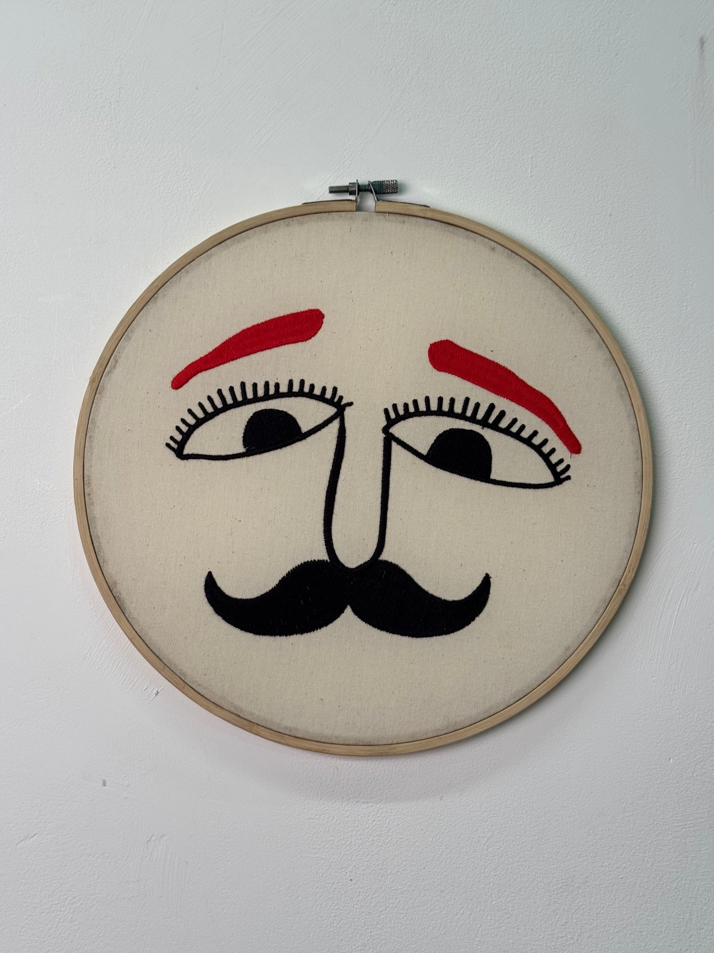 Contemporary Danish embroidery ring faces
