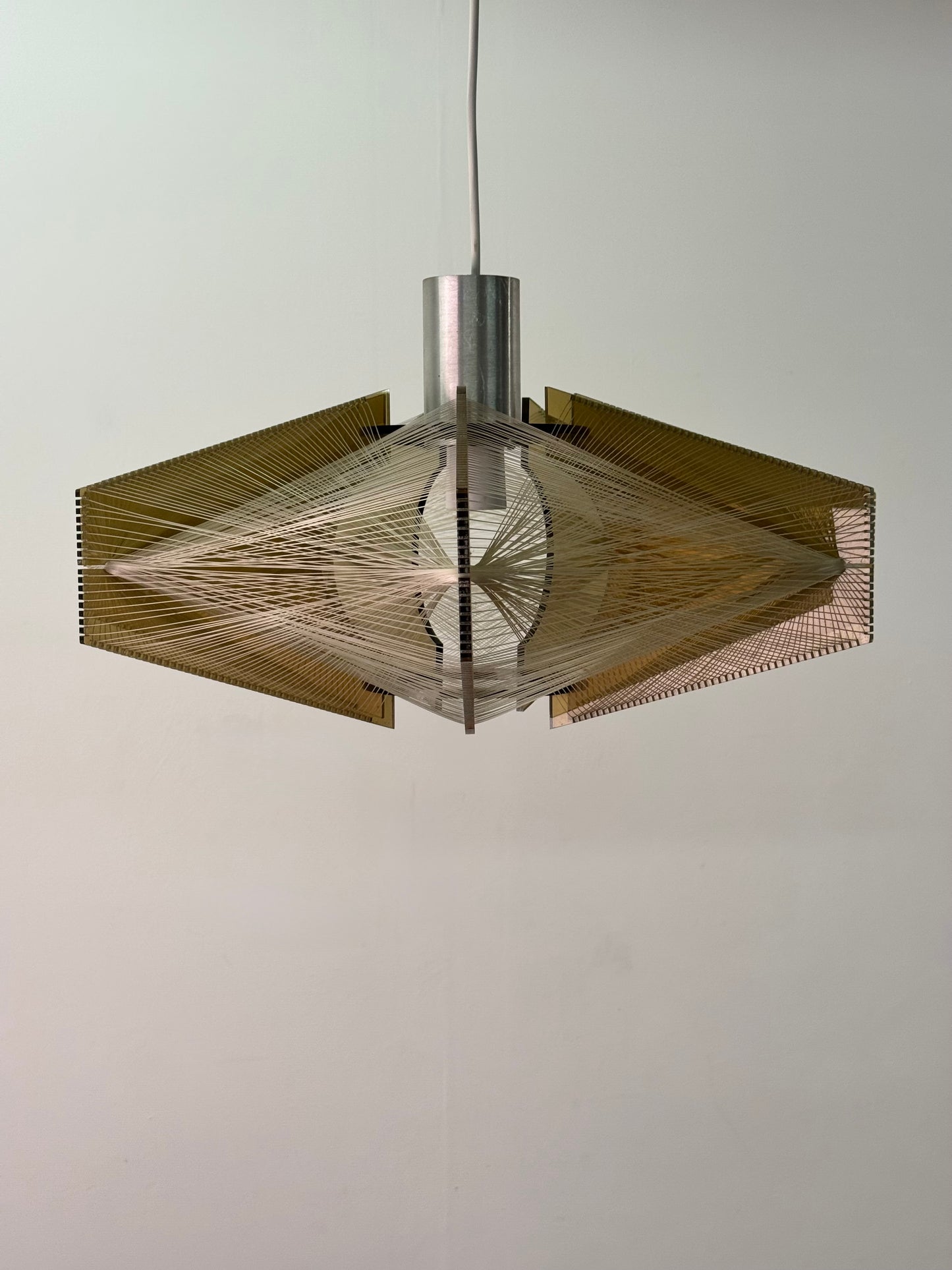 Nylon string light by Paul Secon