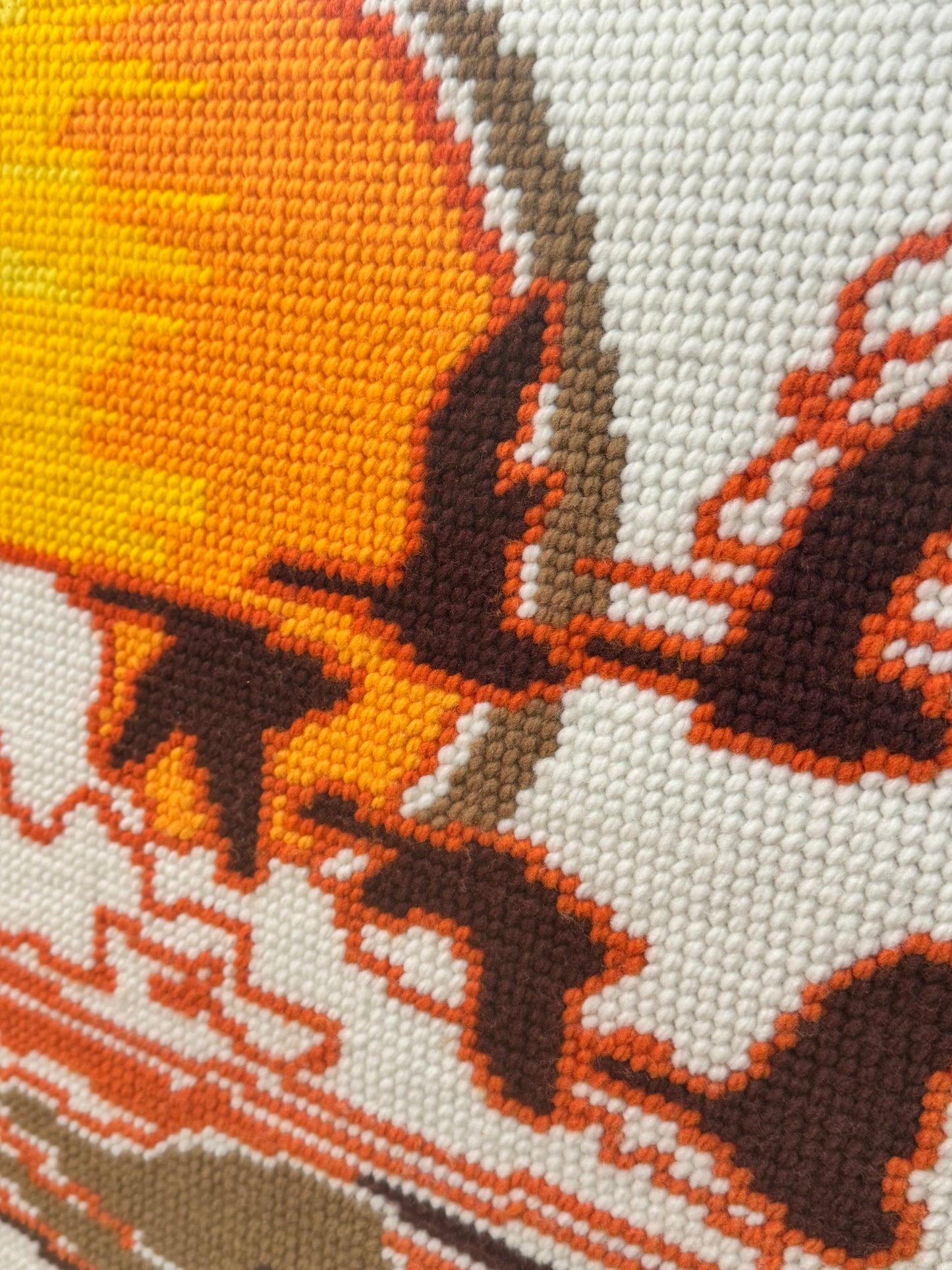 1970s tapestry picture of flying geese in a sunset