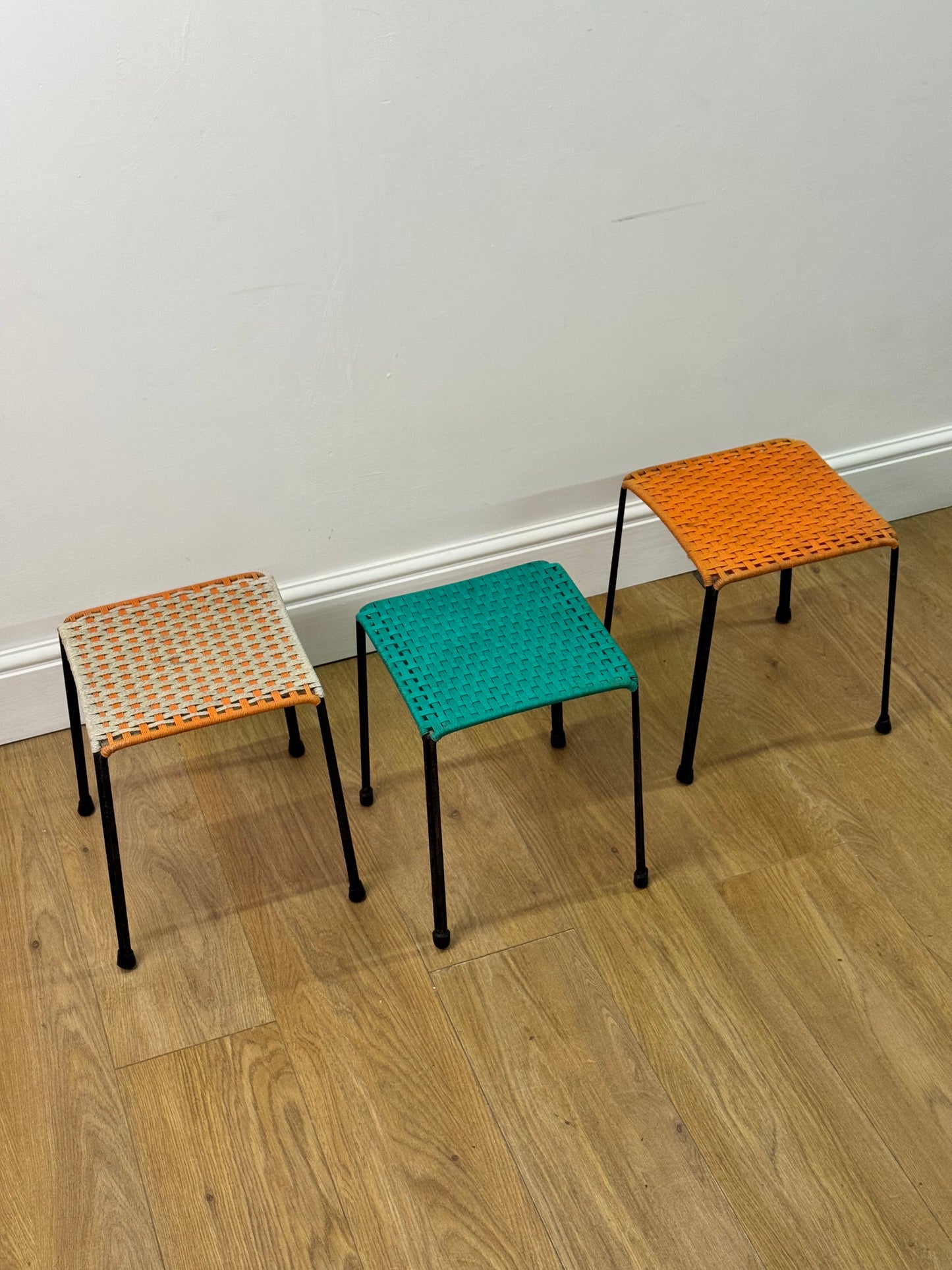 1950s woven stools on metal legs