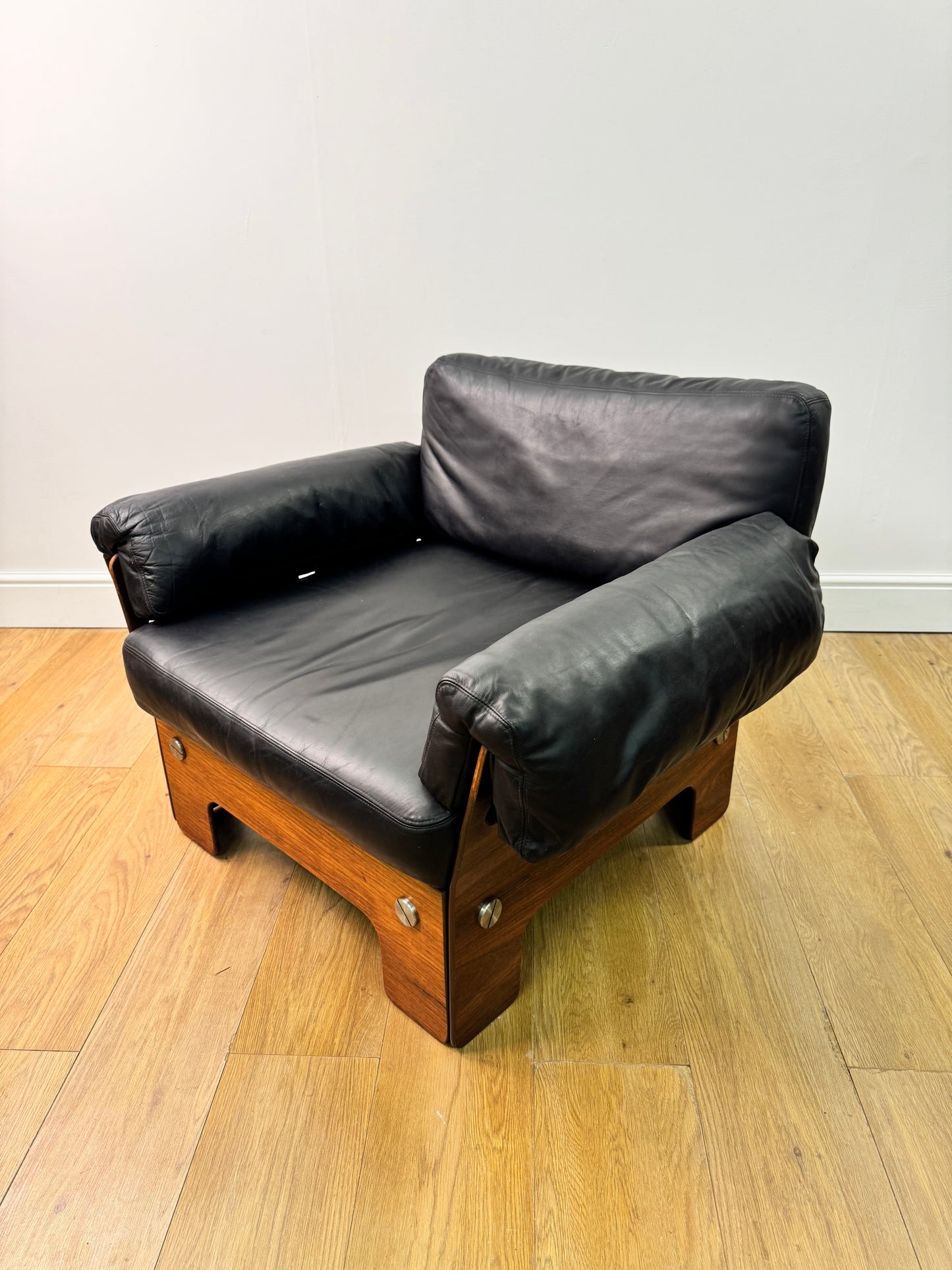 Plywood and Leather armchair by John Hardy
