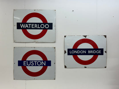 Vintage enamel underground signs
