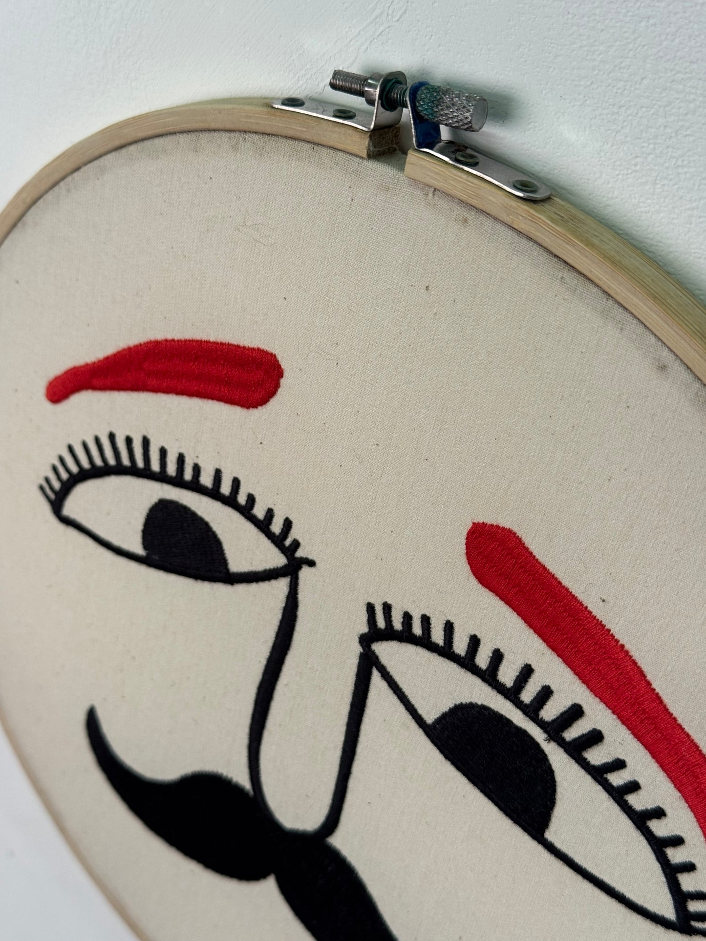 Contemporary Danish embroidery ring faces