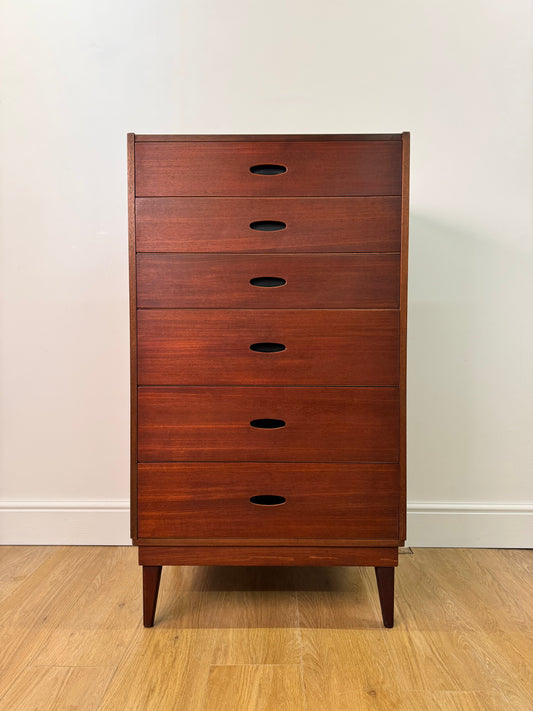 Tall teak chest of drawers by Frank Guille