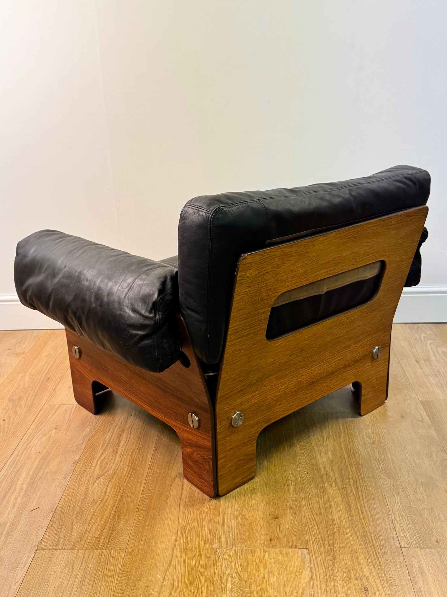 Plywood and Leather armchair by John Hardy