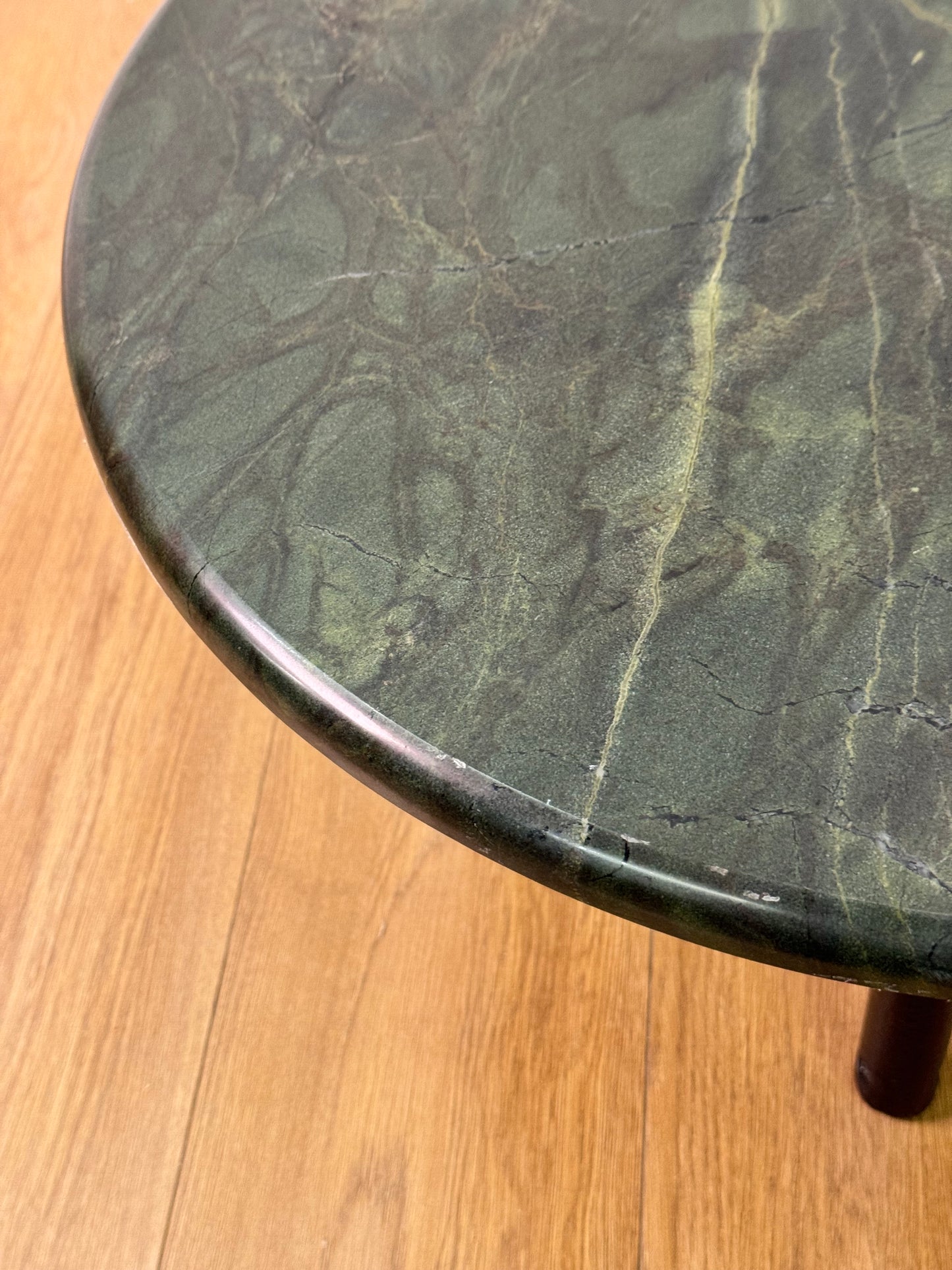 1980s marble top circular occasional table on black steel legs