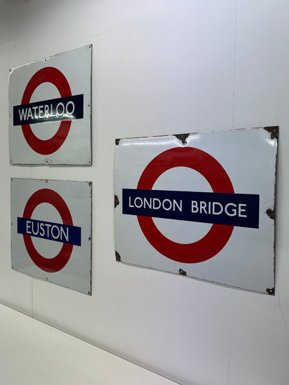 Vintage enamel underground signs
