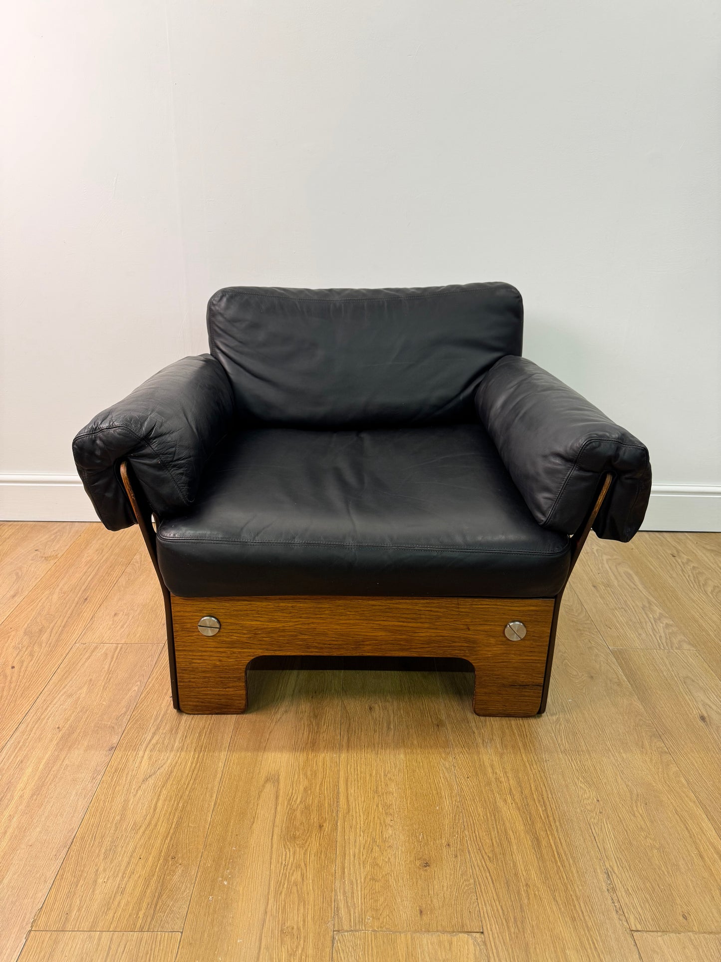 Plywood and Leather armchair by John Hardy