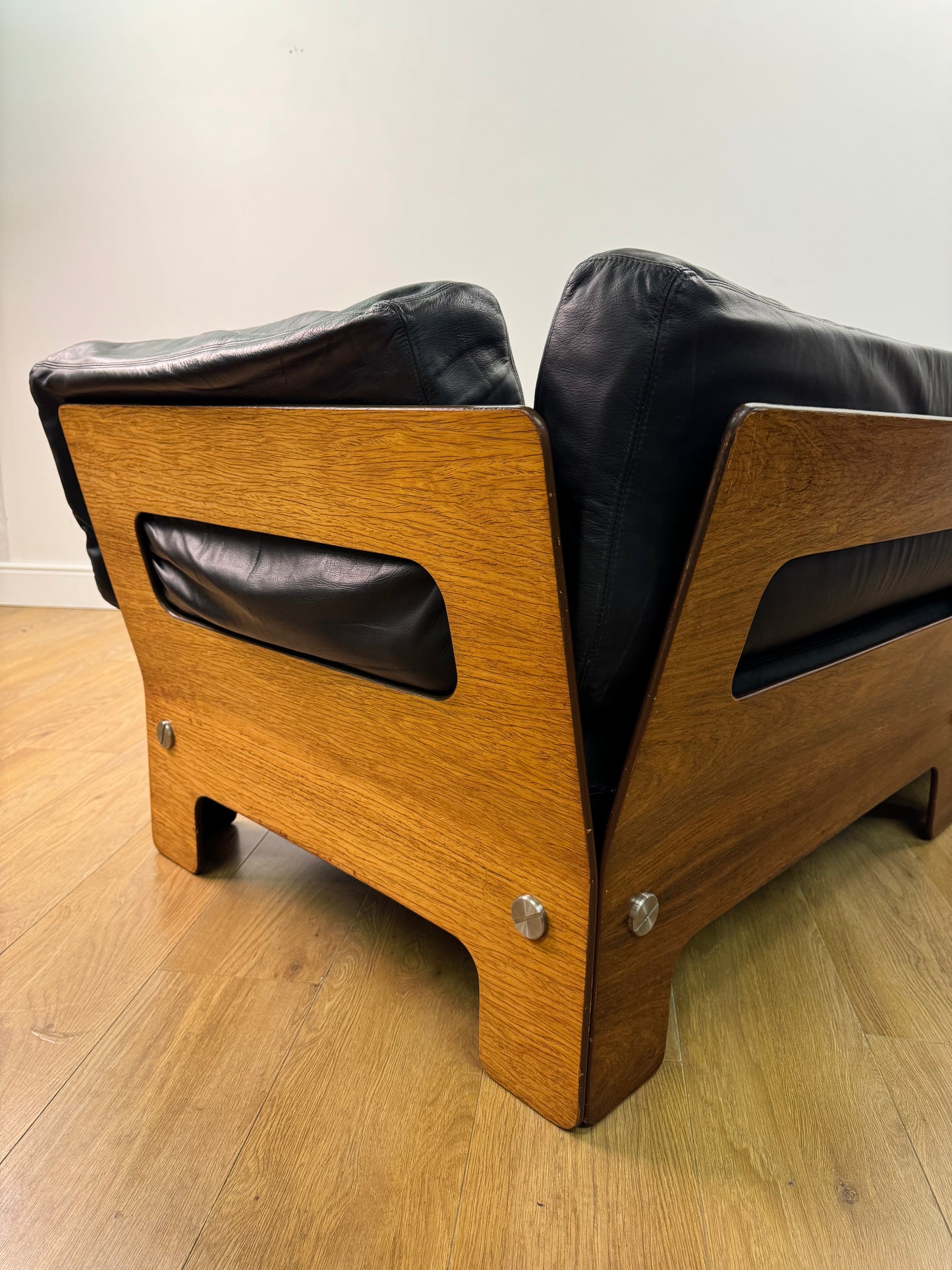 Plywood and Leather sofa designed by John Hardy