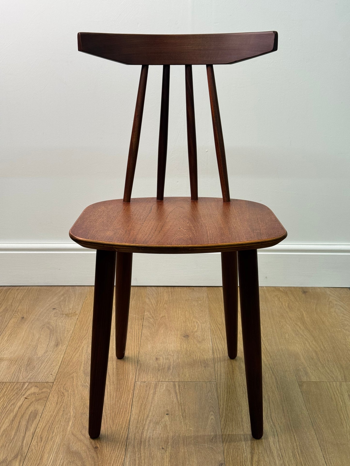 Teak stick back chair by Frem Rojle