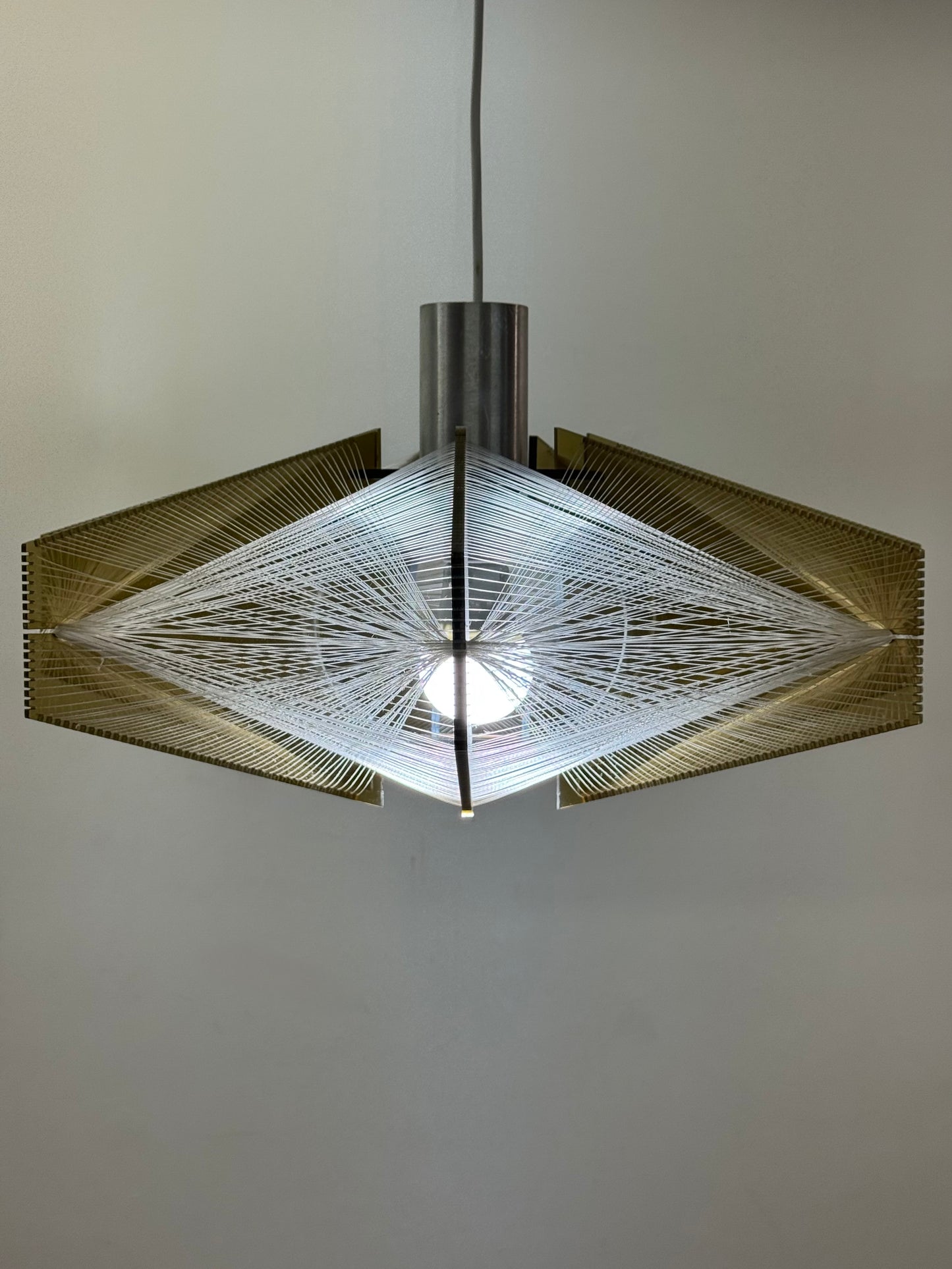 Nylon string light by Paul Secon