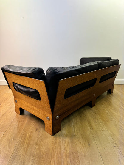 Plywood and Leather sofa designed by John Hardy