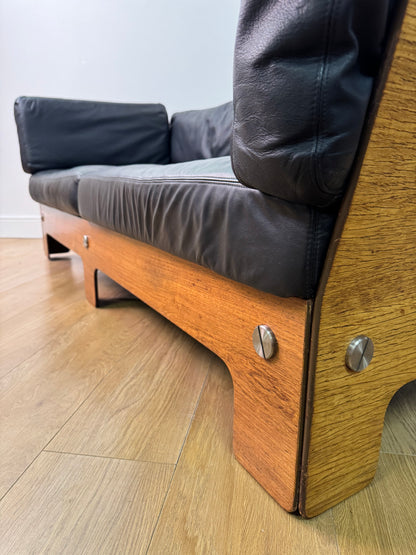Plywood and Leather sofa designed by John Hardy