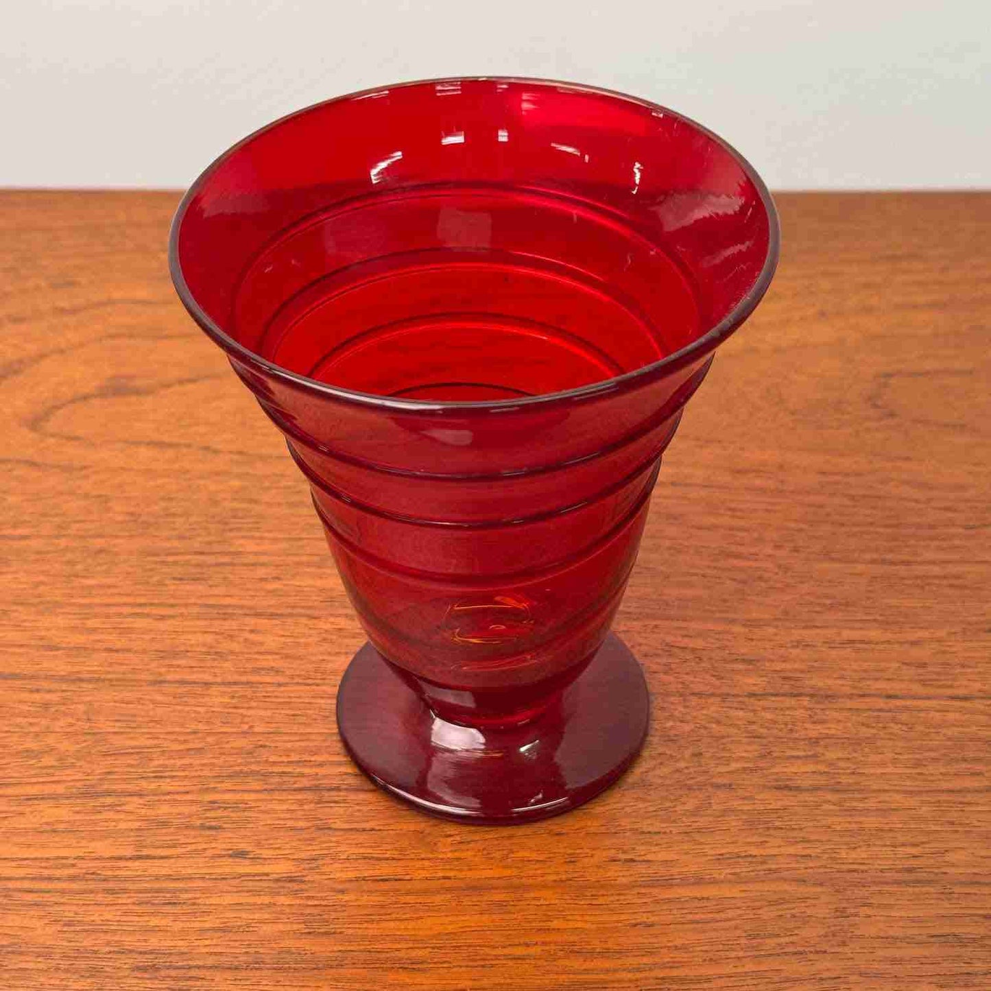 Whitefriars ruby ribbon trail footed vase